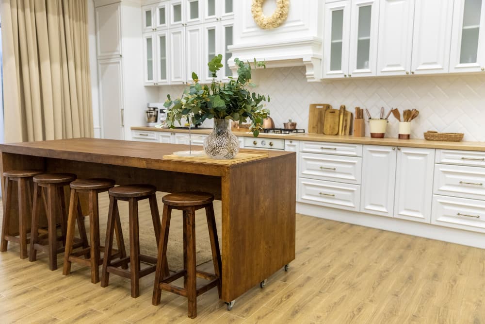 Kitchen example with island seating and a central gathering area.